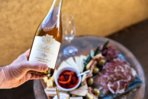 the perfect cheese and charcuterie board paired with sparkling wine